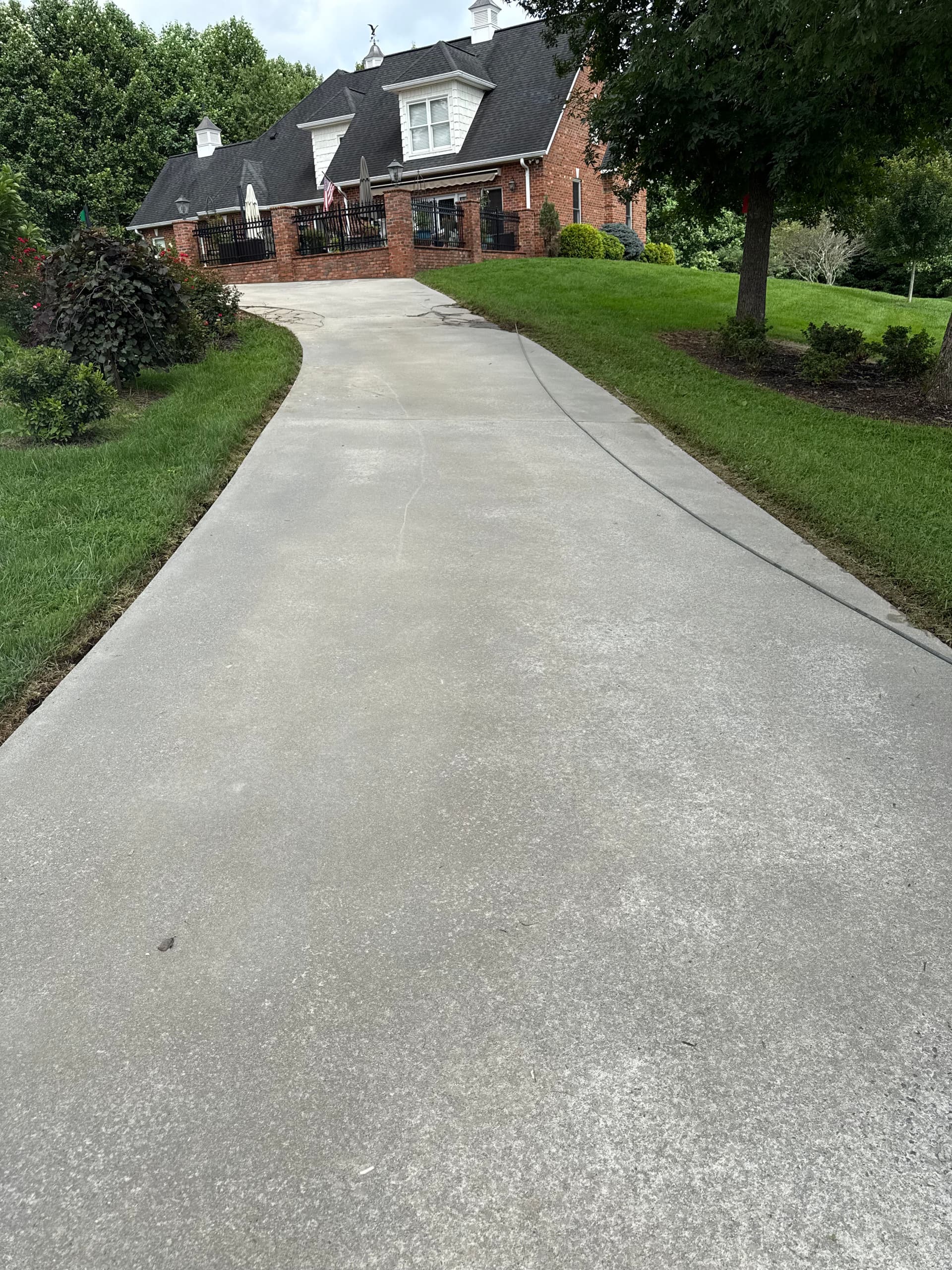 Gallery photos for Driveway Sparkle Restored with Expert Cleaning: Image #1
