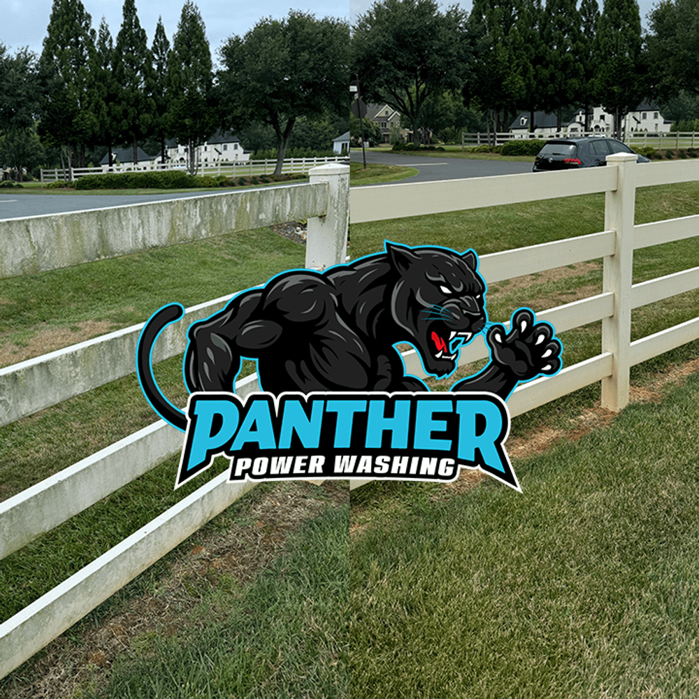 Panther Power Washing logo on a fence with a residential backdrop and green lawn.